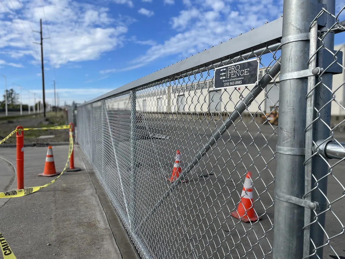 Close-up detail of branded chain link installation