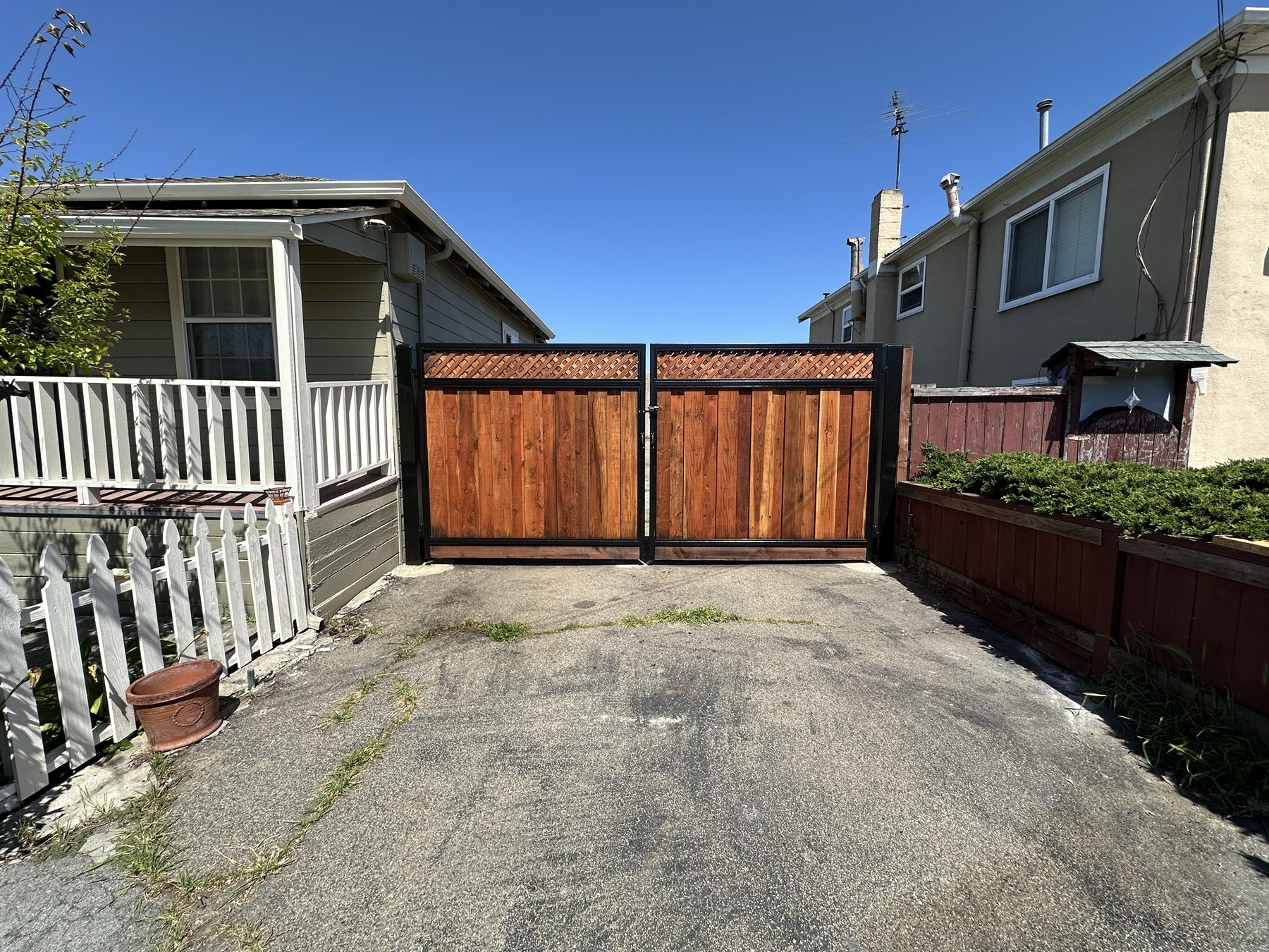 Steel frame wood driveway gate